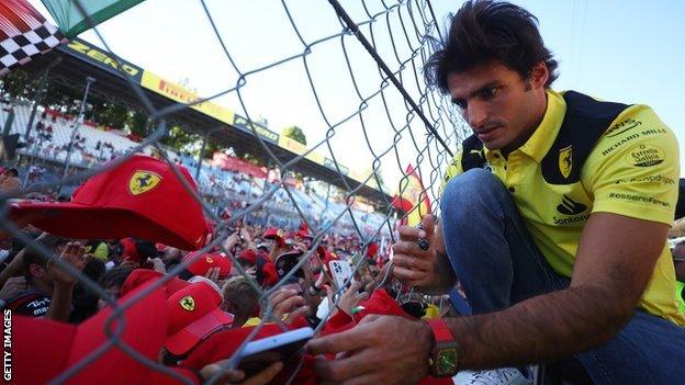 Carlos Sainz signs autographs