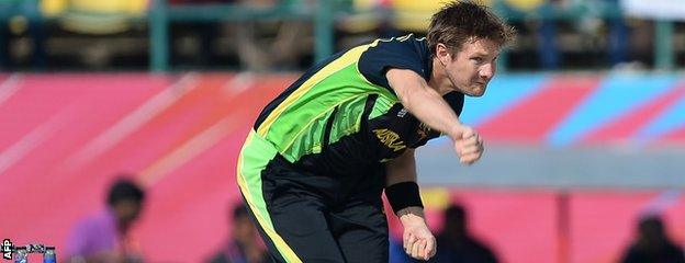 Shane Watson bowls