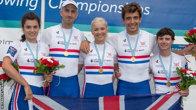 Grace Clough (left) and the rest of the World Championship-winning team