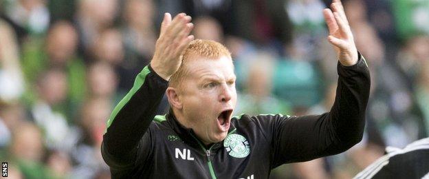 Hibernian head coach Neil Lennon urges his side on against Celtic