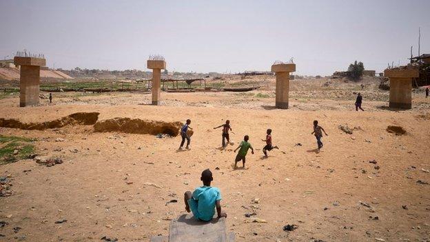 Children playing football in Mali