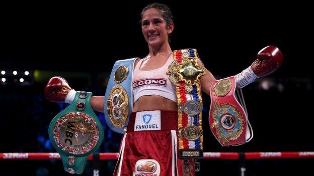 Amanda Serrano with her world titles