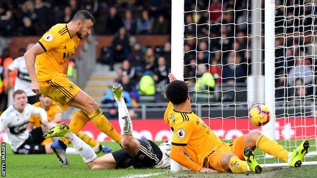 Romain Saiss scores Wolves' equaliser against Fulham