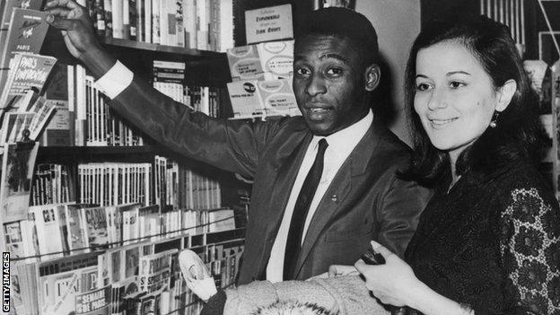 Pele and Rose in a bookshop in Paris.