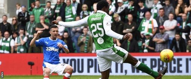 Jason Holt scores as his shot deflects into the Hibs net by Efe Ambrose