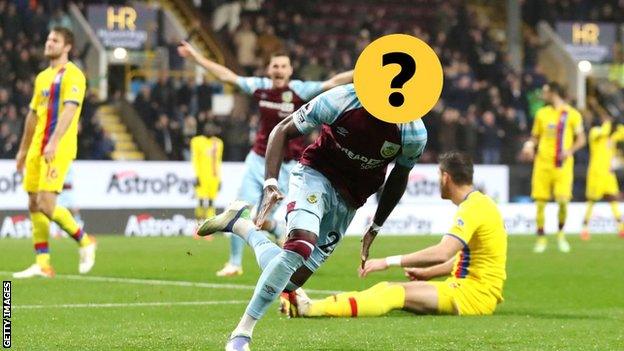 A Burnley player with a question mark hiding his face