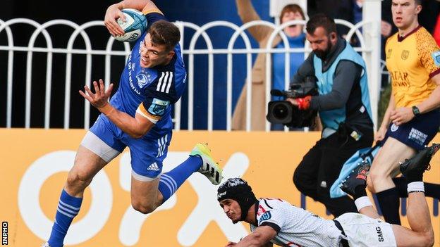 Leinster's Garry Ringrose runs past Thaakir Abrahams to score one of his two tries at the RDS