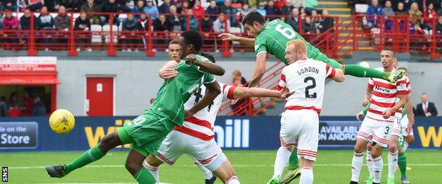 Dedryck Boyata is alert to the free-kick from Leigh Griffiths as he knocks in Celtic's first goal