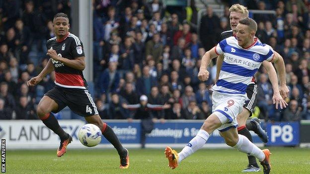 Conor Washington tucks the ball in to give QPR the lead