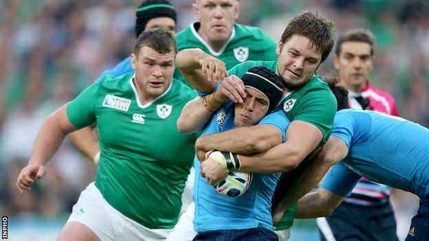 Peter O'Mahony and Iain Henderson in action against Edoardo Gori of Italy