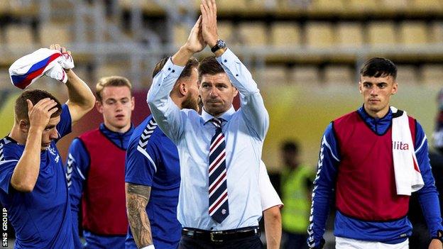 Manager Steven Gerrard applauds the 300 or so Rangers fans who travelled to Macedonia