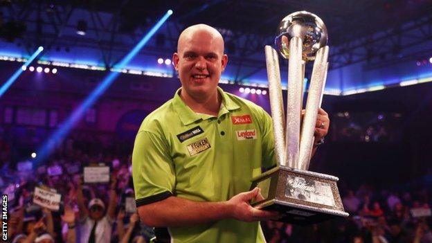 Michael van Gerwen with the PDC trophy