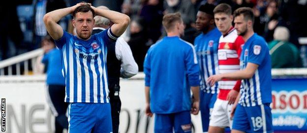 Hartlepool United players react to their relegation from the Football League last season