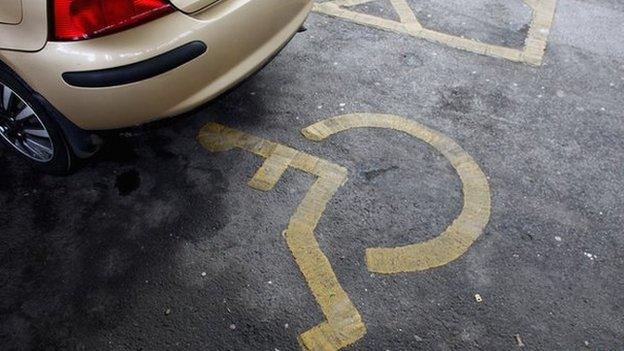 Car parked in disabled parking space