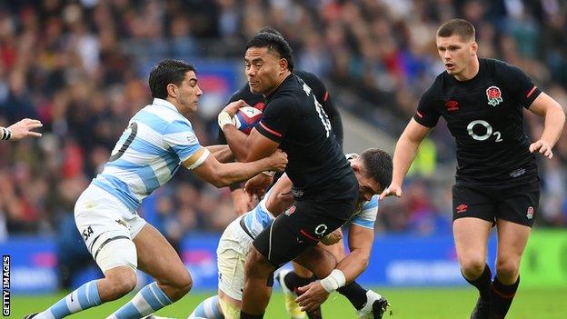 Manu Tuilagi and Owen Farrell try to break through