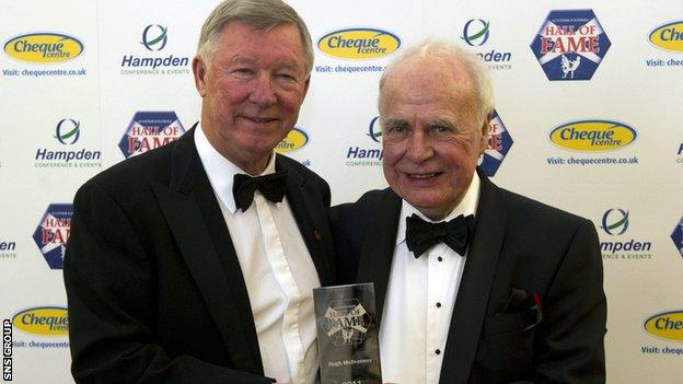 Sir Alex Ferguson (left) welcomes Hugh McIlvanney to the Scottish Football Hall of Fame in 2011