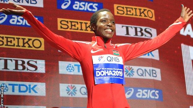 The late Agnes Tirop celebrating her 10,000m bronze medal at the 2019 World Athletics Championships