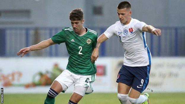 Trai Hume in action for Northern Ireland Under-21s