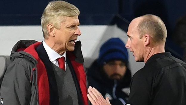 Arsene Wenger and Mike Dean