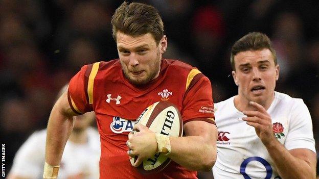 Dan Biggar runs past George Ford