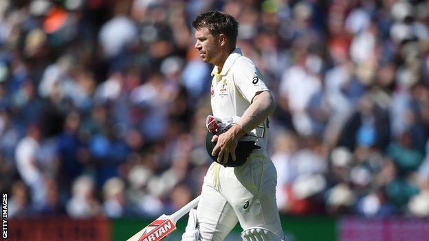 David Warner trudges of after being dismissed