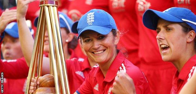 Former England captain Charlotte Edwards with a trophy in her playing days