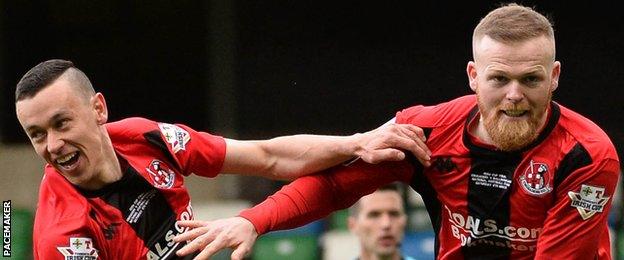 Ross Clarke's goal capped a 3-0 win for Crusaders at Windsor Park