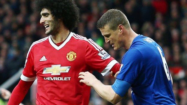 Marouane Fellaini and Robert Huth