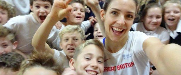 Isobel Pooley with pupils at her former school, Court Moor School in Fleet, Hampshire