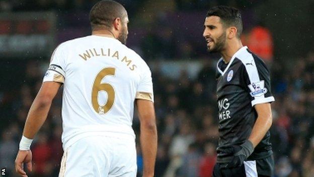 Swansea City's Ashley Williams and Leicester City's Riyad Mahrez