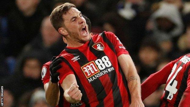 Dan Gosling celebrates his goal