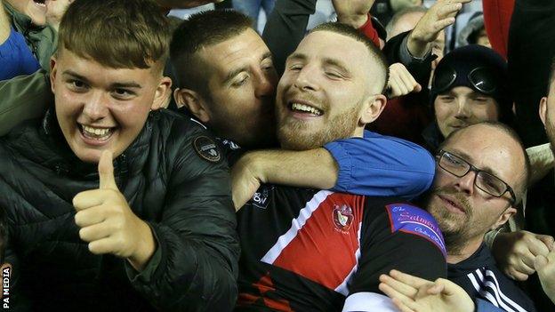 Jackson Hastings is mobbed by Salford supporters