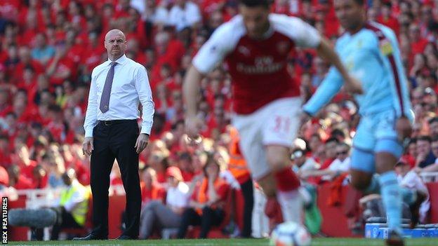 Burnley manager Sean Dyche watches his side