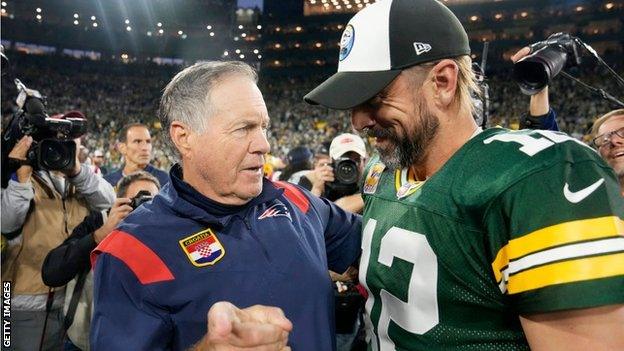 Aaron Rodgers with Bill belichick