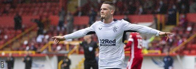 Ryan Kent celebrates his winner v Aberdeen