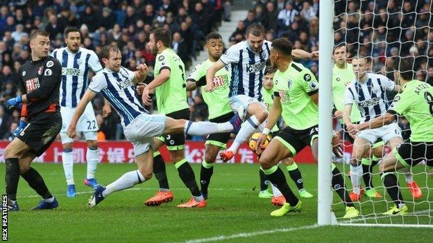 Gareth McAuley (centre) got in just ahead of team-mate Craig Dawson (left) to fire Albion's winner against Bournemouth