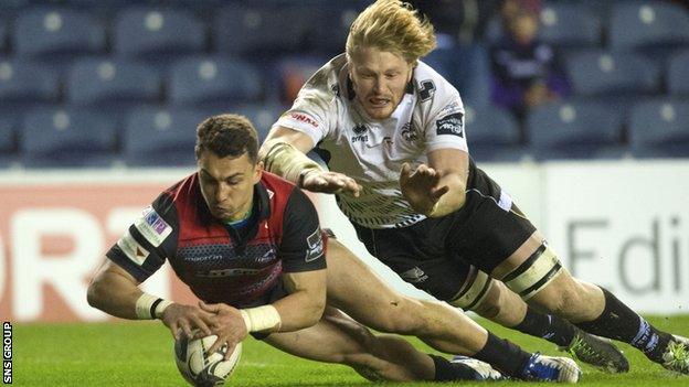 Damien Hoyland dives over for his first try of the evening