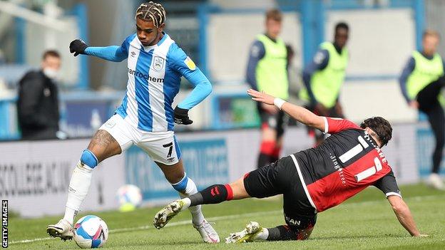 Juninho Bacuna (left) in action for Huddersfield Town