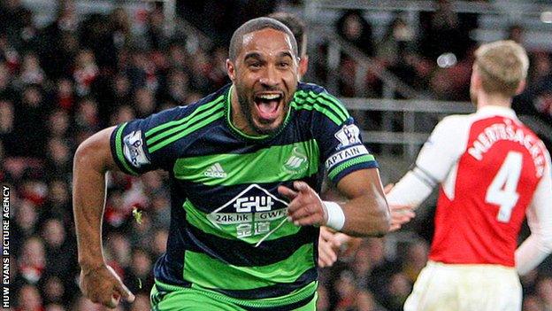 Ashley Williams celebrates scoring against Arsenal