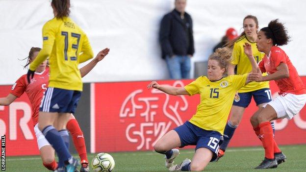 Scotland defender Sophie Howard makes an interception against the well-organised Swiss