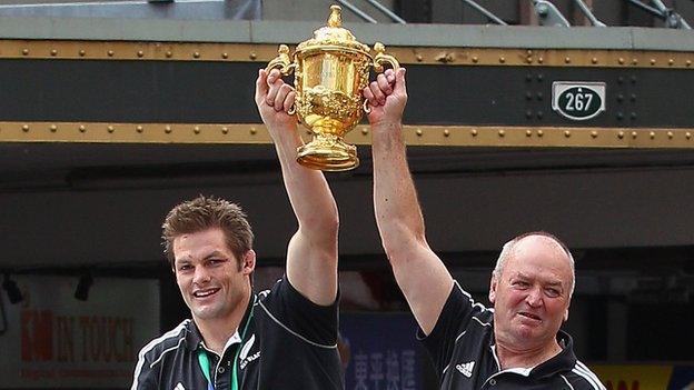 Richie McCaw and Graham Henry celebrate New Zealand's 2011 World Cup win