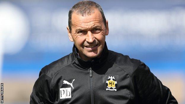 Cambridge United head coach Colin Calderwood on the sidelines