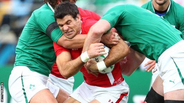 Mike Phillips is roughed-up by Ireland's pack