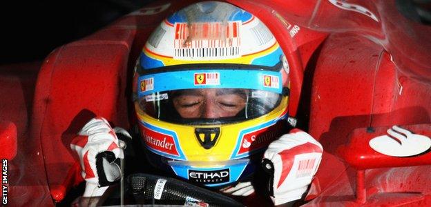 Fernando Alonso celebrates winning the 2010 Korean Grand Prix with Ferrari