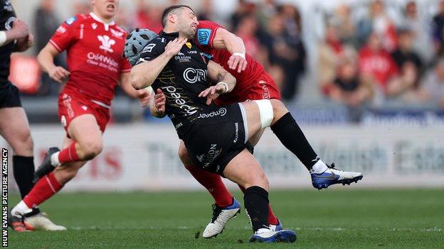 Scarlets centre Jonathan Davies was shown a yellow card for this tackle on Josh Lewis