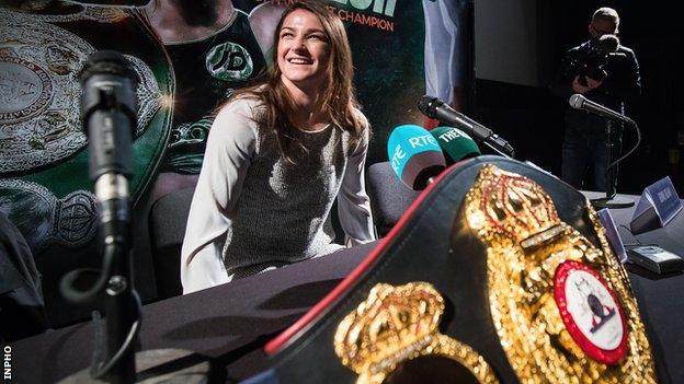 Katie Taylor kept her WBA belt close by during a homecoming press conference in Dublin on Tuesday