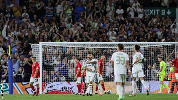 Mateusz Klich of Leeds United scores his team's third goal against Barnsley