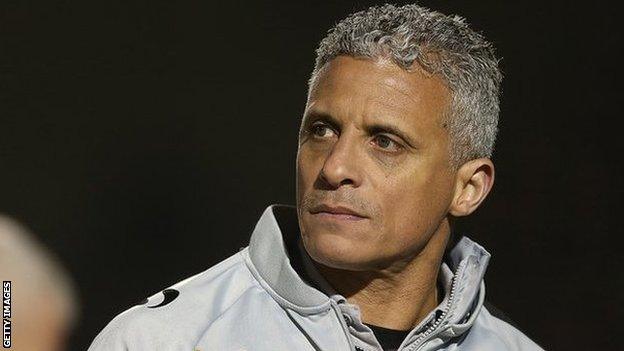 New Northampton Town boss Keith Curle looks to the left while manager of Carlisle United