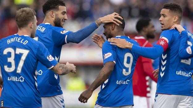 Rangers' Jermain Defoe celebrates his goal with Connor Goldson (left)