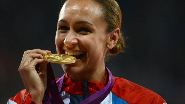 Jessica Ennis-Hill bites her Olympic gold medal